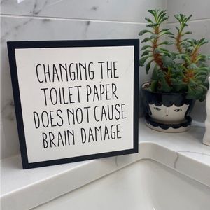 Funny bathrooms black and white décor quote .